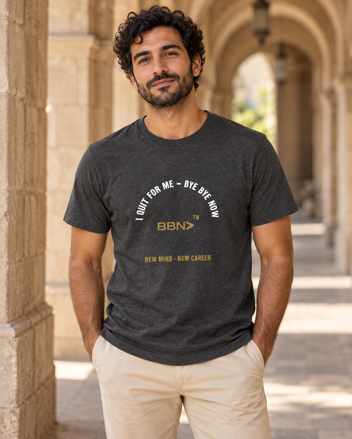 AI styling concept: Man outdoors wearing a dark gray heather T-shirt with white “I Quit For Me – Bye Bye Now” lettering and a gold BBN logo.
