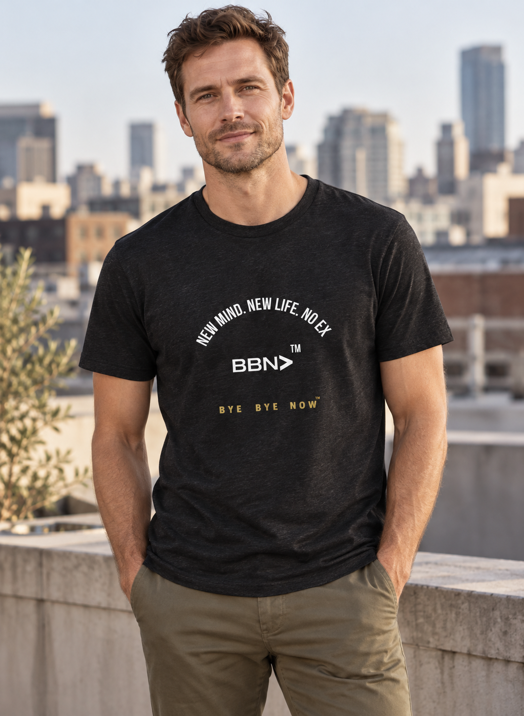 AI styling concept: Man outdoors wearing a black heather T-shirt with white “New Mind New Life No Ex” lettering and a white BBN logo.