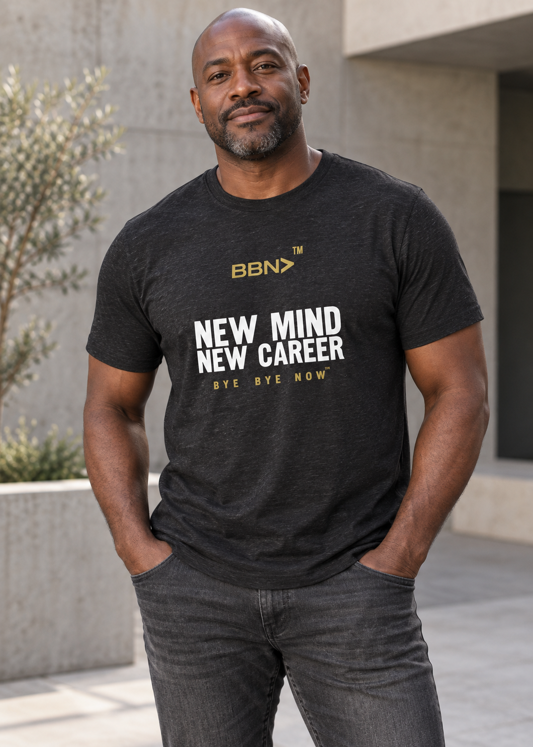 AI styling concept: Man outdoors wearing a black heather T-shirt with white “New Mind New Career” lettering and a gold BBN logo.